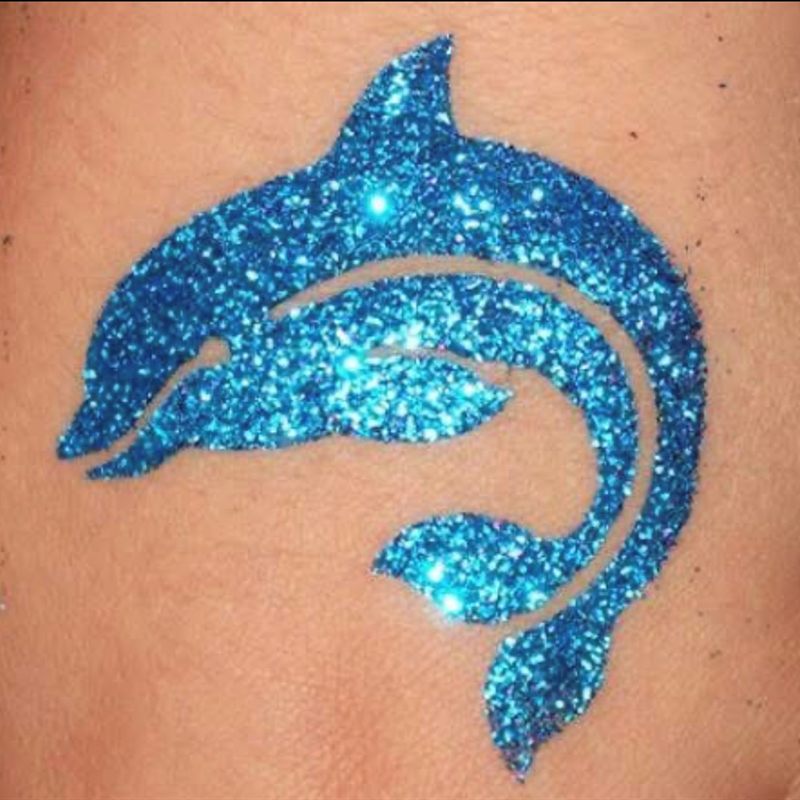 Blue glitter dolphin tattoo